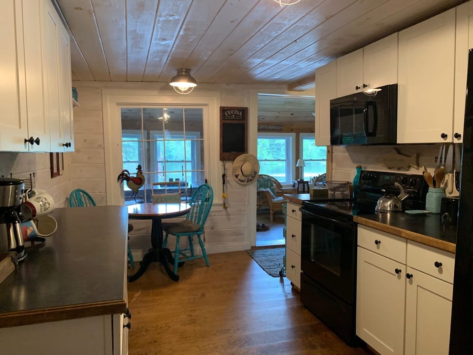 Kitchen has everything you need to make meals plus griddle and grills on deck. 