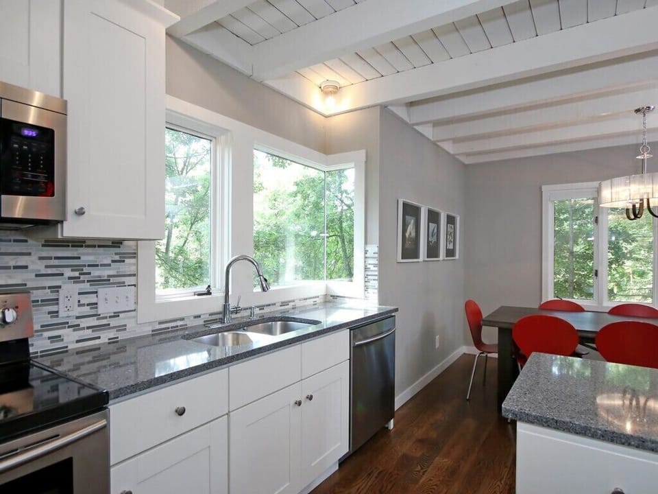 Updated kitchen with stainless appliances. Utility room with washer and dryer.