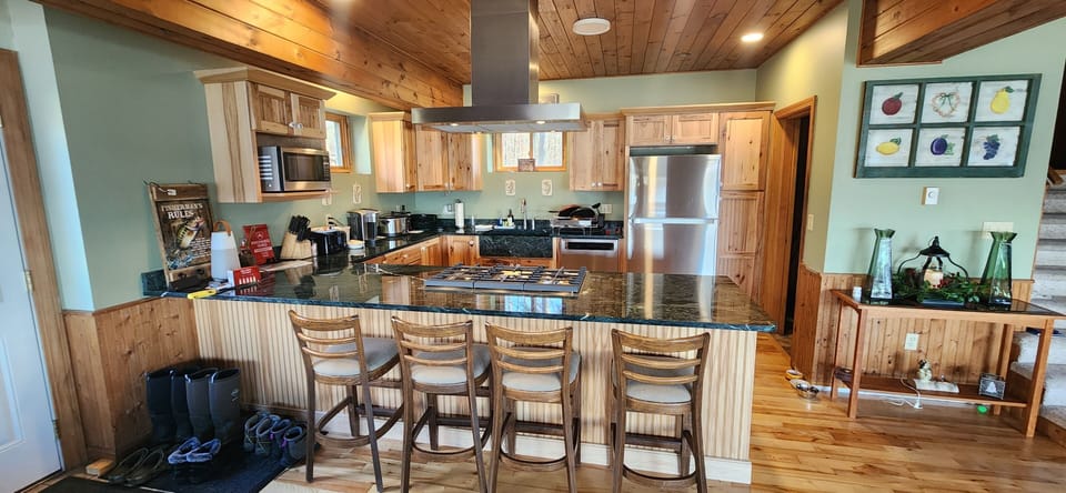 New in 2024 fully stocked gourmet kitchen with hickory cabinets 