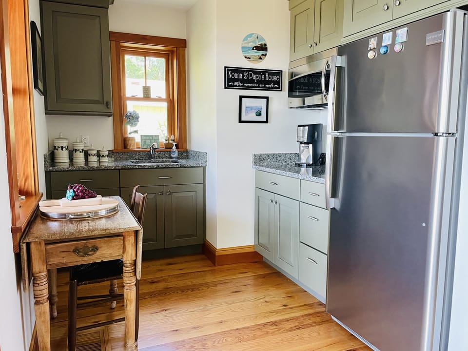 Kitchenette serving entry level bedrooms and media room