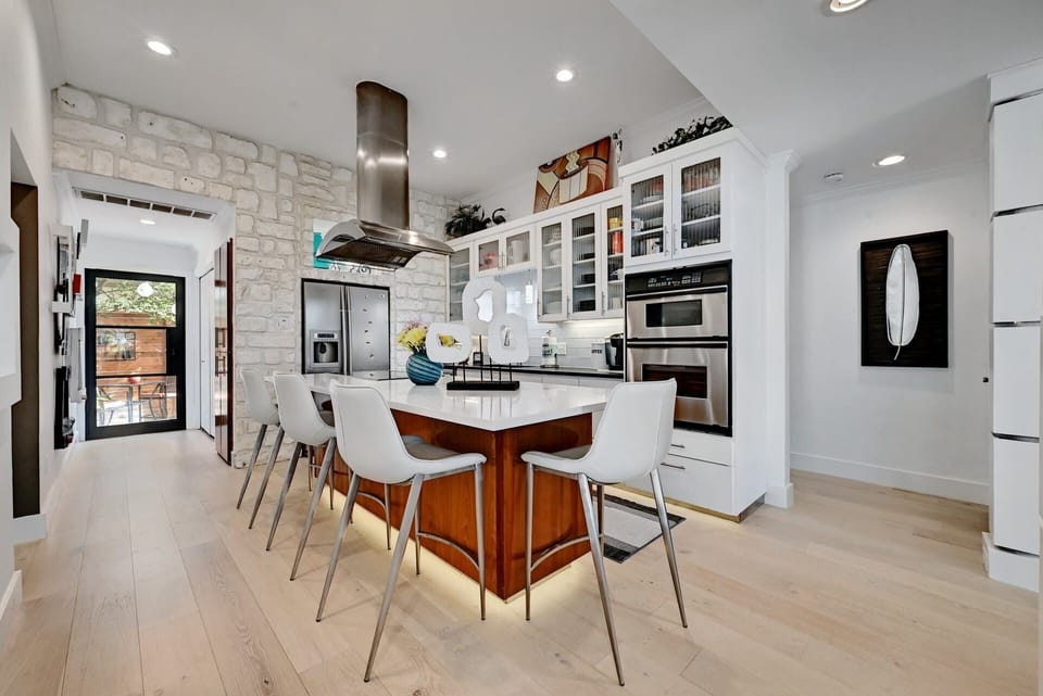 All stainless steel appliances.  Laundry room down the hall.  