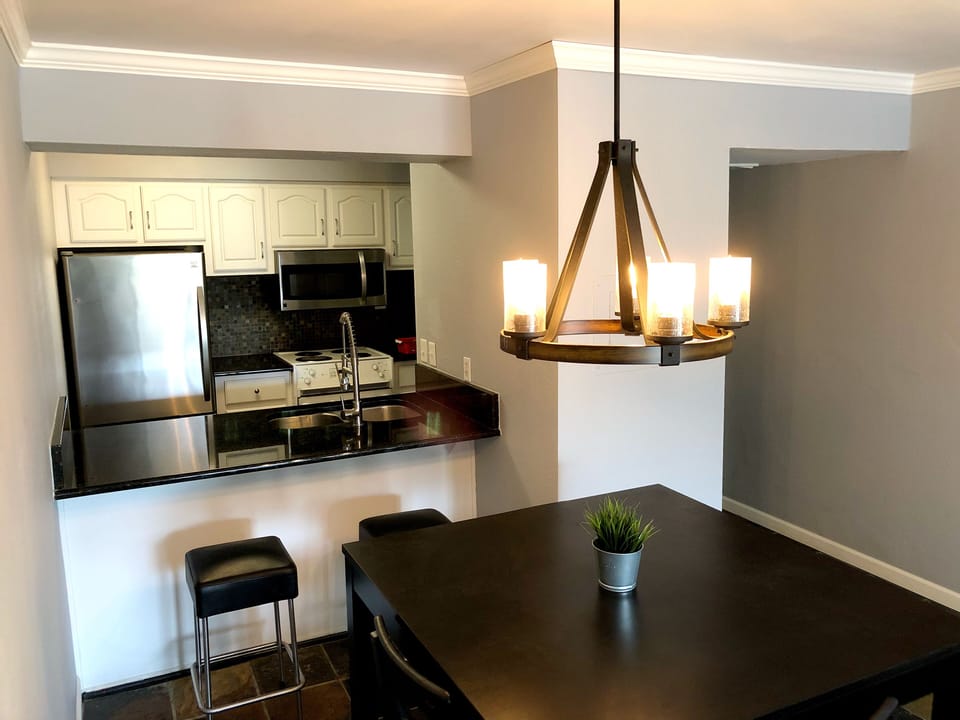 Fresh paint, crown moulding, granite and updates throughout. 