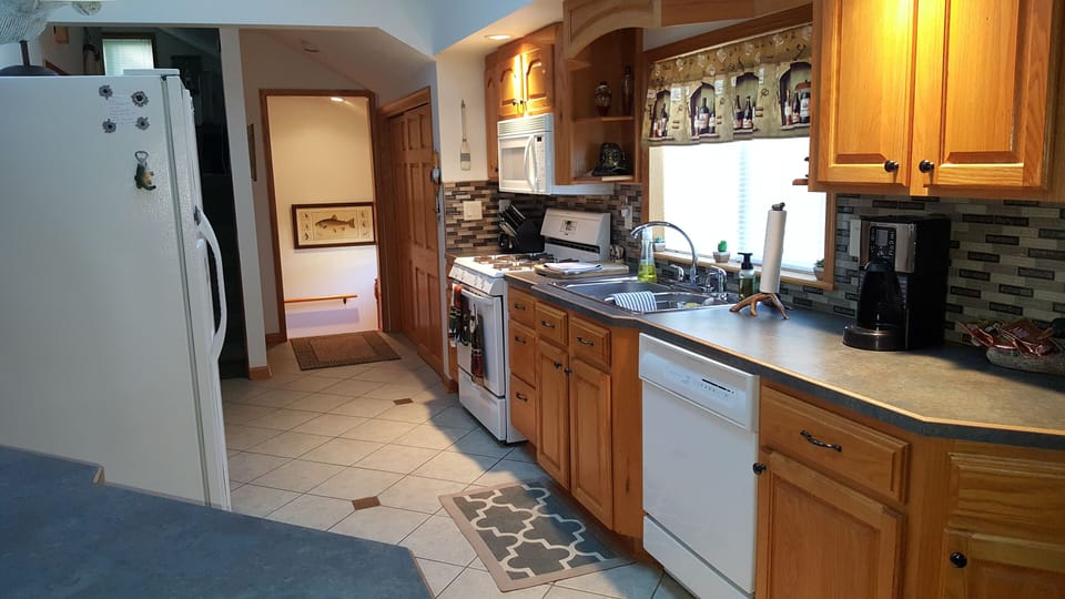 Kitchen, looking towards entryway