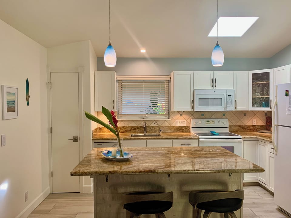 full kitchen with stove and dishwasher