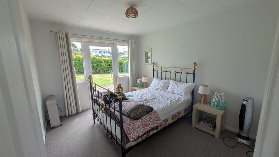 Bedroom 3 - with access to front deck area 
(Double bed)