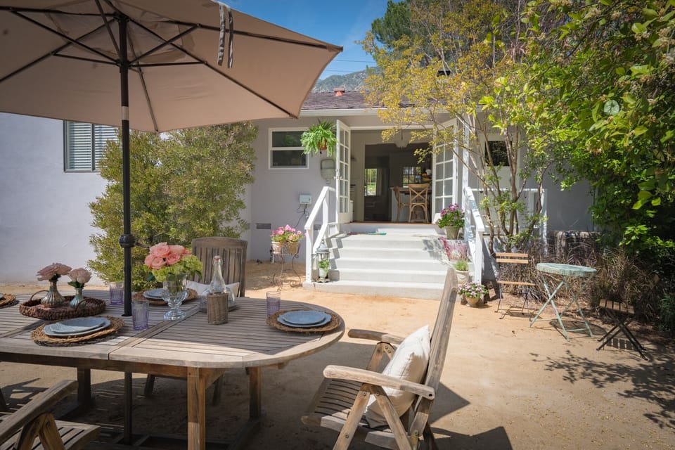 Relaxing dining area in the private back yard - looking toward the mountains