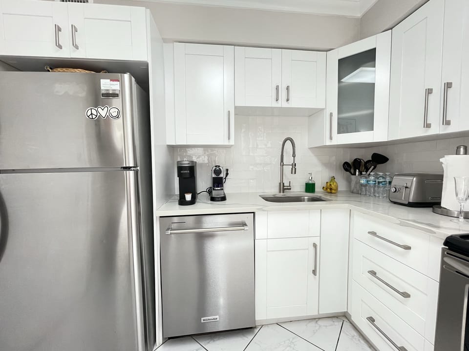 Fully equipped kitchen with stainless steel appliances