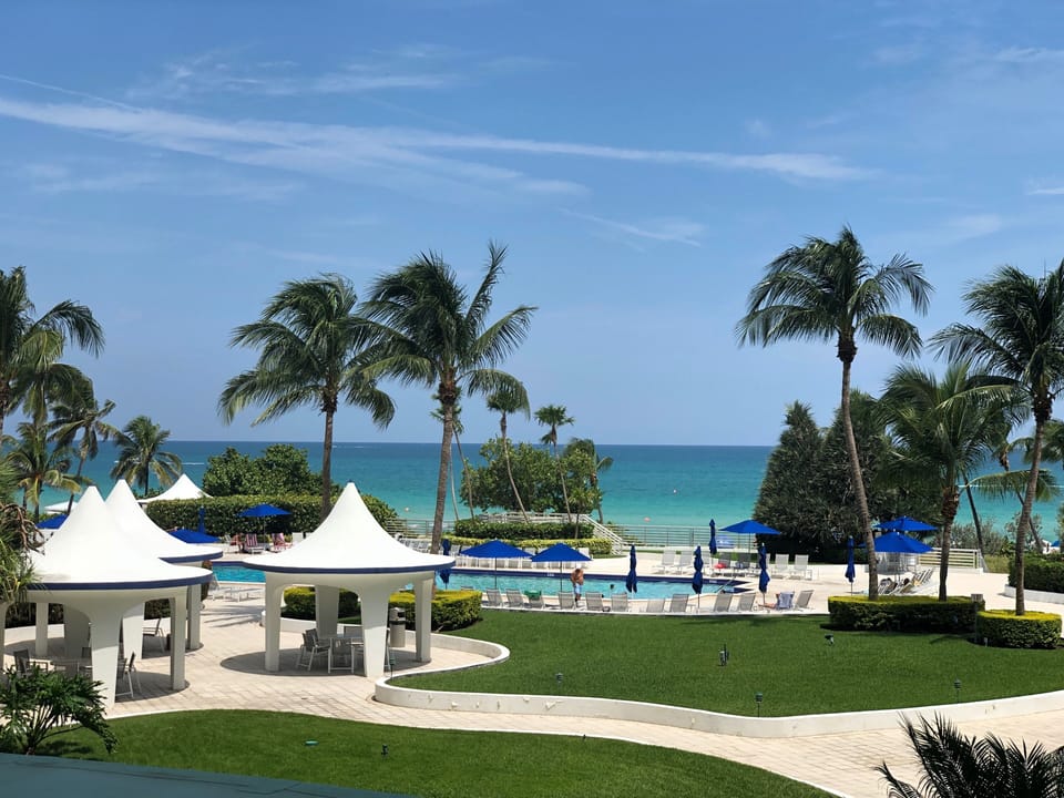 View of the Pool and Beach from the Balcony
overlooking the ocean.
