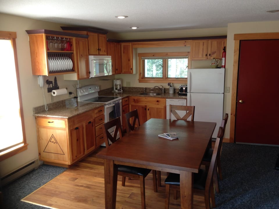 Fully-equipped kitchen with granite countertops.