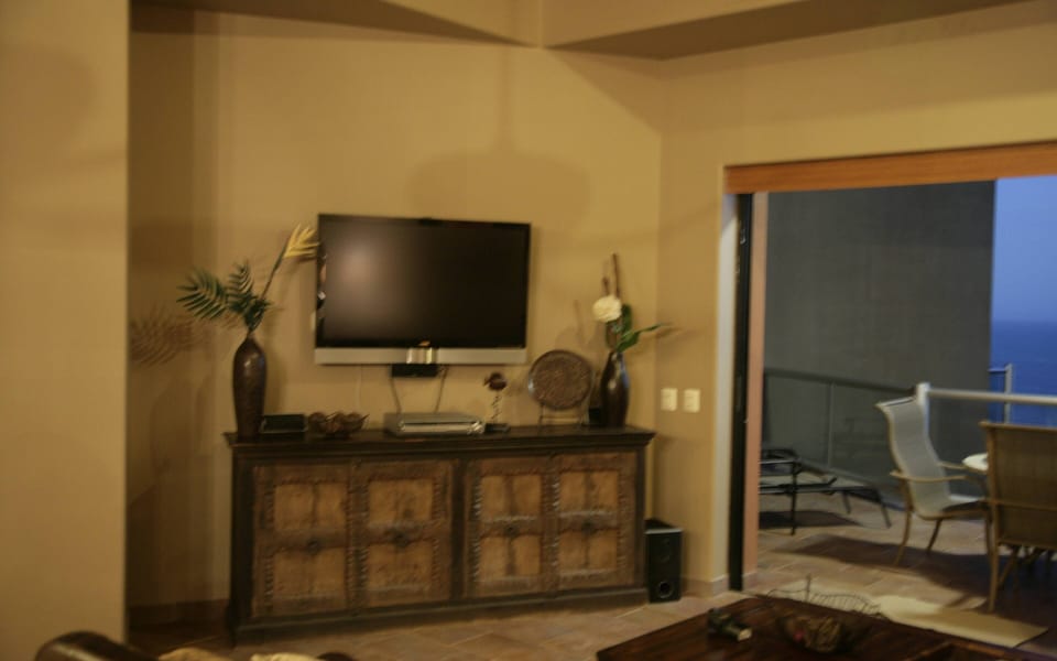 Panel TV right off the balcony with ocean view.