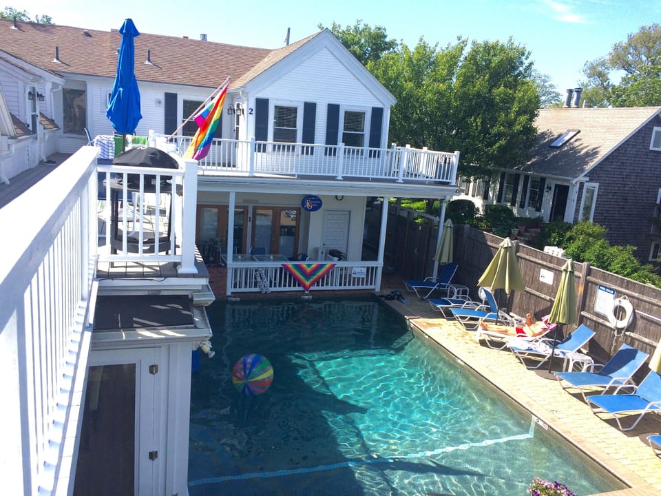 Heated pool with spa and lounge chairs