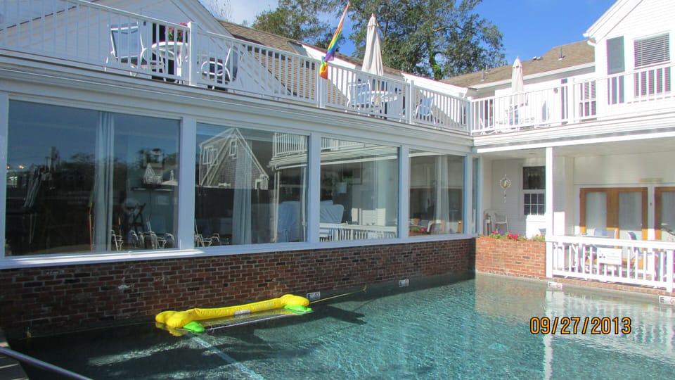 Wall of glass overlooking pool