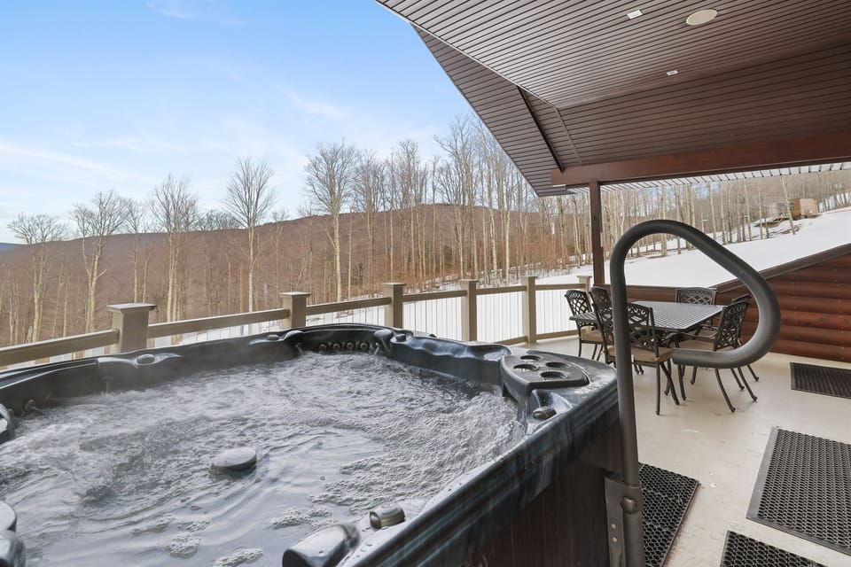8 person hot-tub is quintessentially located on the 3rd floor deck offering stunning views from the point of the lakes in the valley and skiiers, bikers and horseback riders passing by
