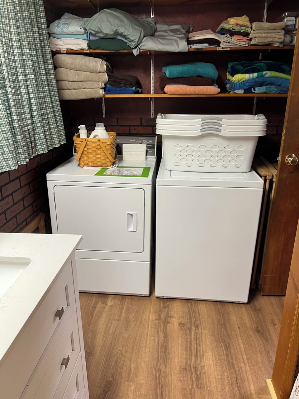 Washer and dryer in main floor bath.