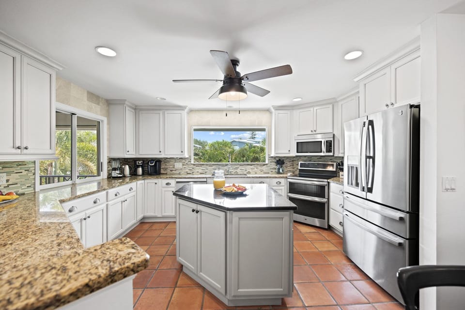 Chef's Kitchen with double oven range, profile refrigerator, fully outfitted