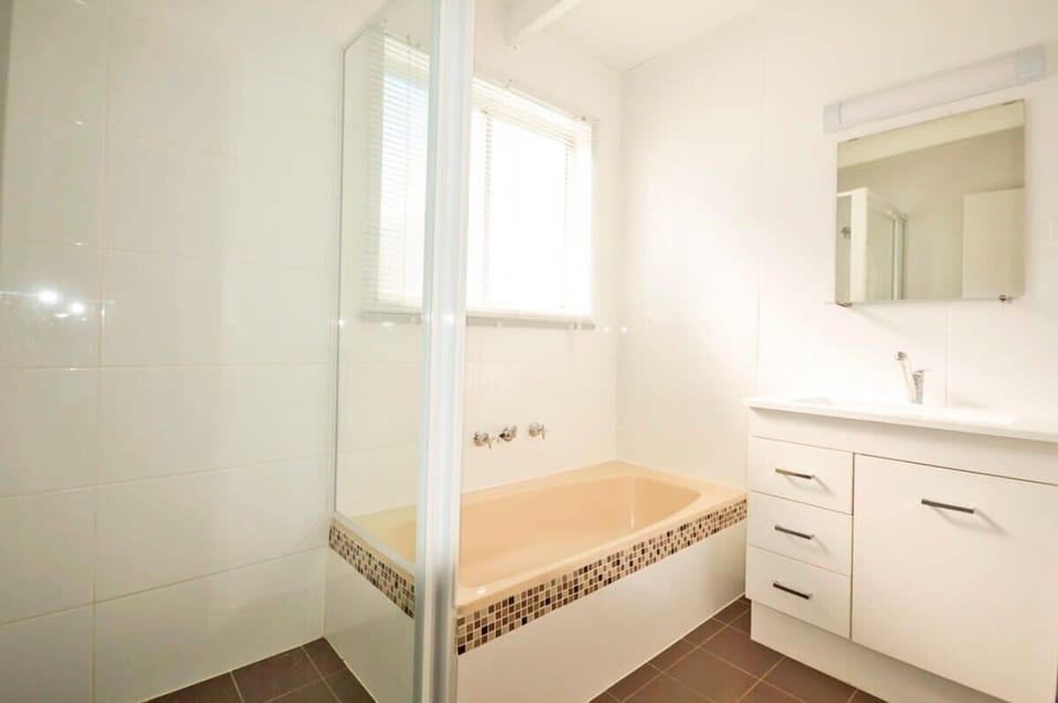 Upstairs bathroom with bath and separate shower