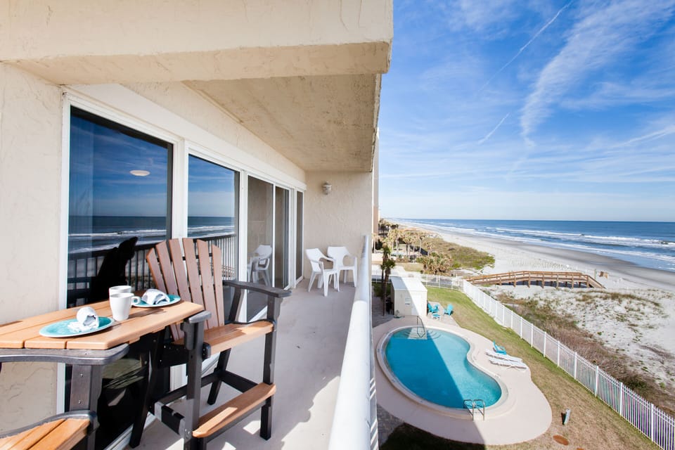 Huge wrap-around balcony, also not right over the pool so peaceful & private.