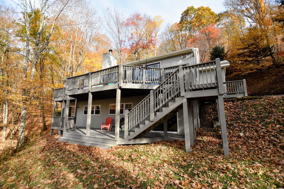 Two large decks along back of house.