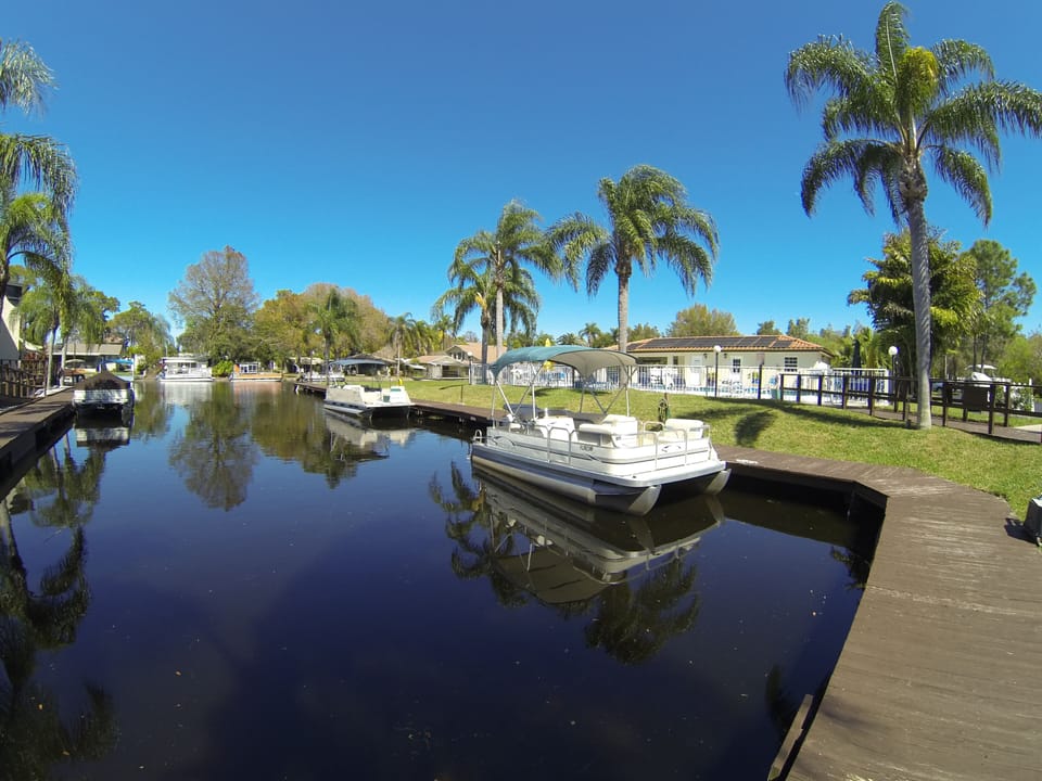 19' pontoon boat waits your arrival!