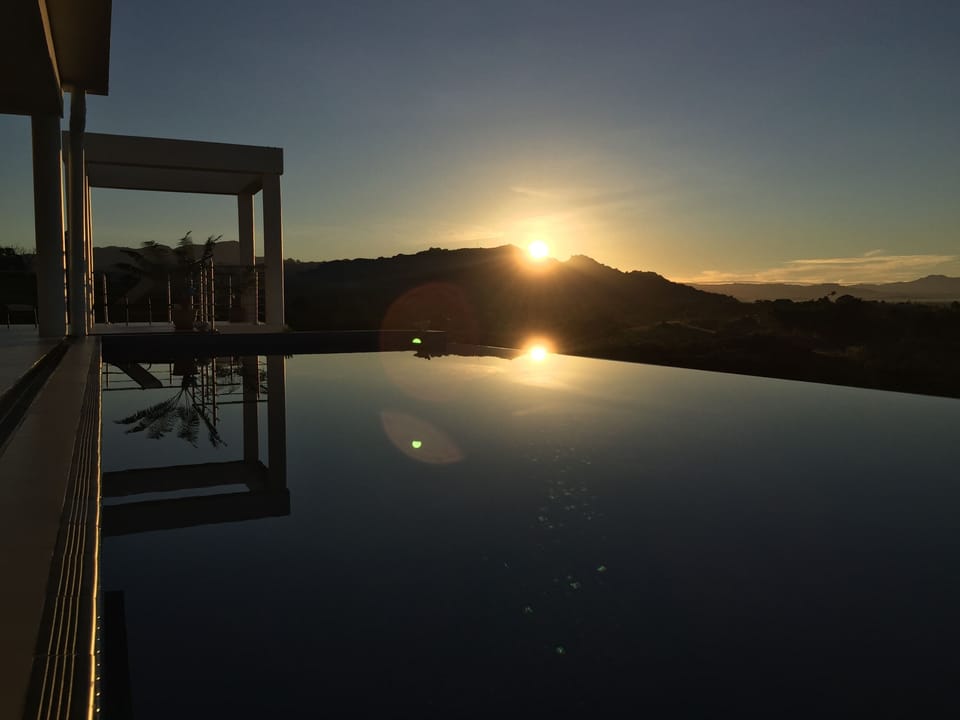 Sunrise.  Perfect way to shake off that jet lag!