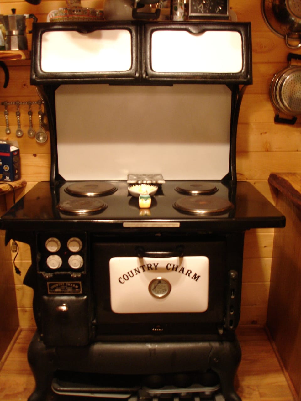 Reproduction antique electric stove. Spices in white 2 cabinets. Air fryer too!
