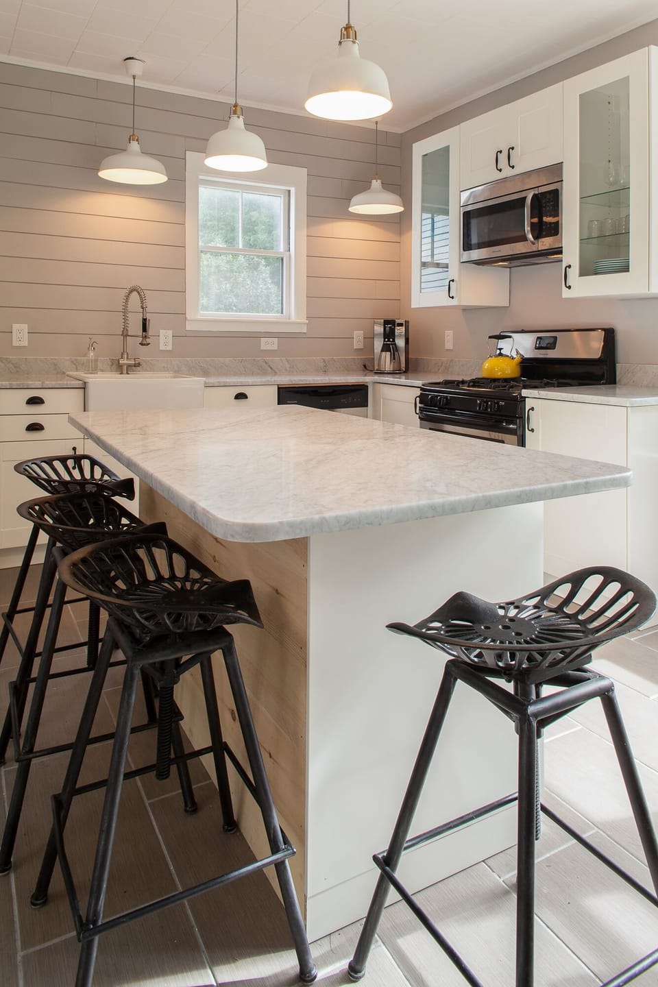 tractor seat stools line the breakfast bar