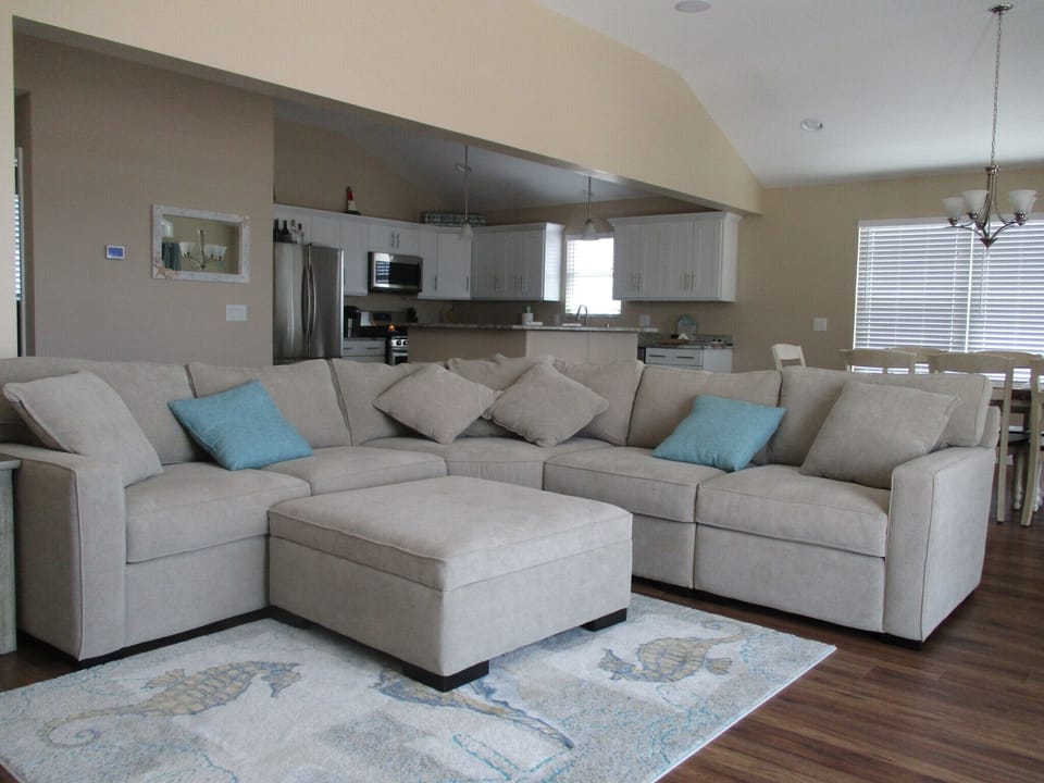 Living room with 65" HD Samsung smart TV.