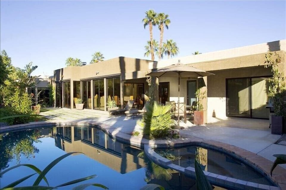 private rear garden and pool/spa view with garden furniture 