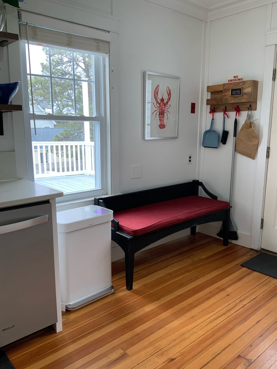 Bench in Kitchen besides the door to the deck.