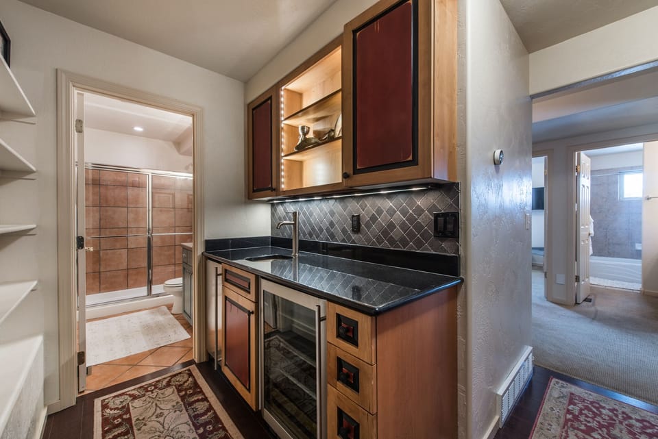 Lower level bar area next to theater room and 4 bedrooms