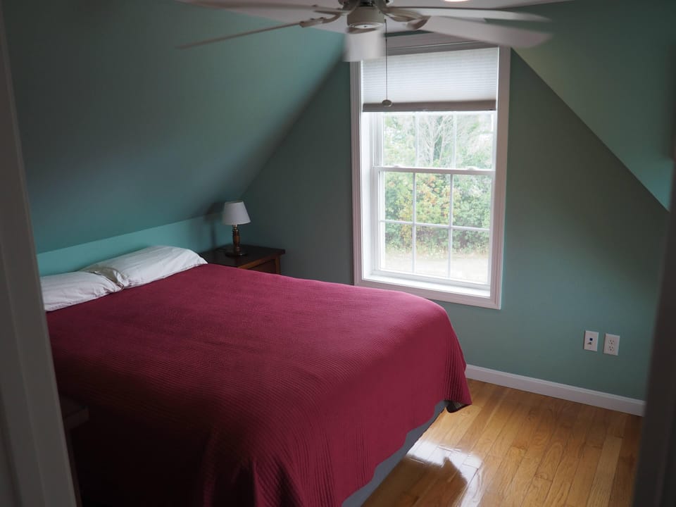 Queen bed in the other 3rd floor bedroom