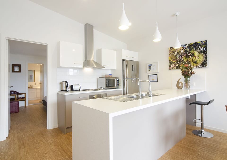 Spacious kitchen with purified water available.