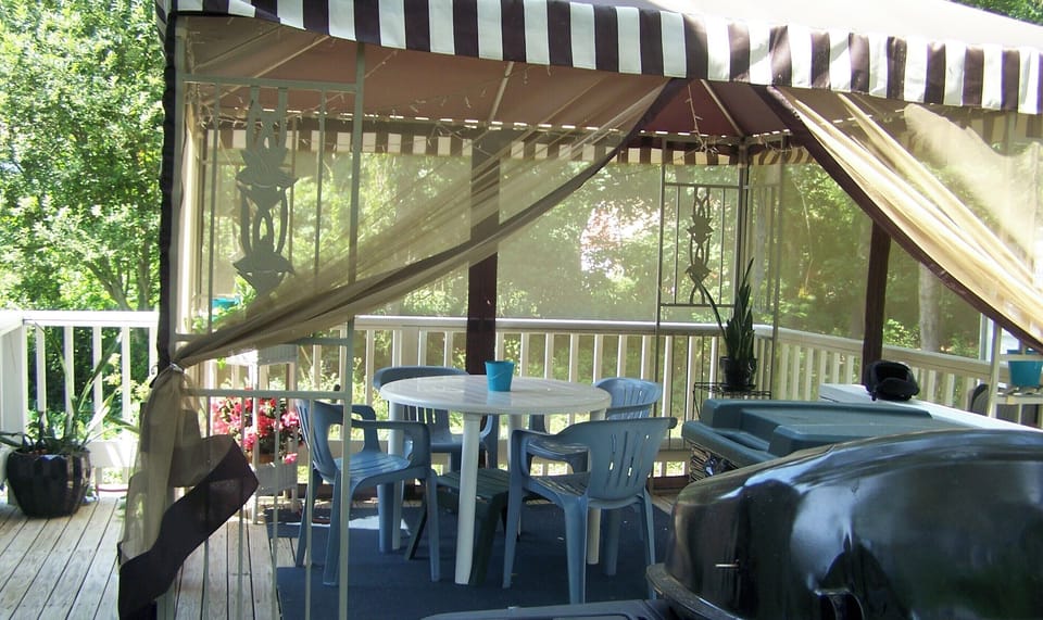 Screened-in gazebo seen here now in back yd/This deck now screened (see pix)