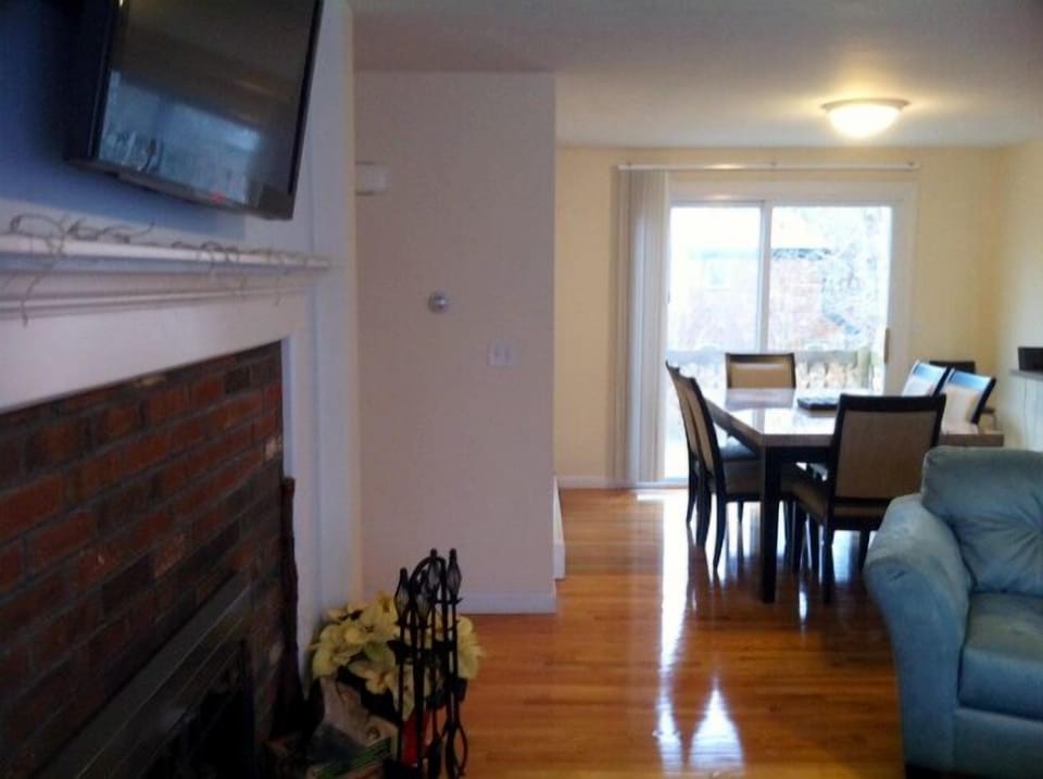 Open Living Room / Dining Room with sliders to the  outside deck.