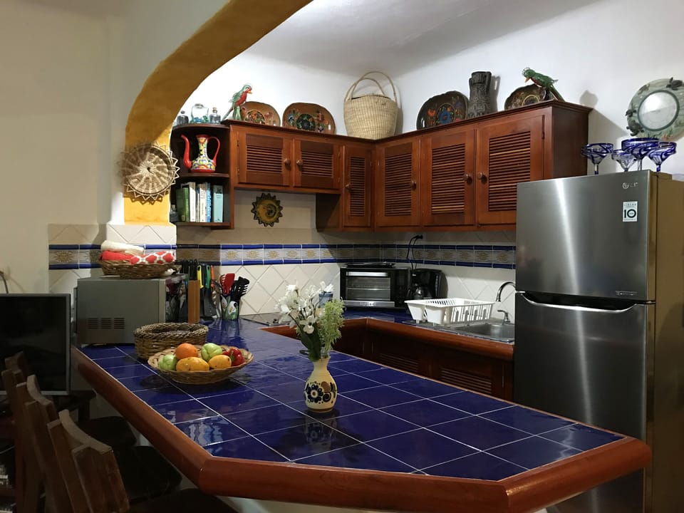 Kitchen is well equipped for all your cooking needs w roomy oven and microwave.
