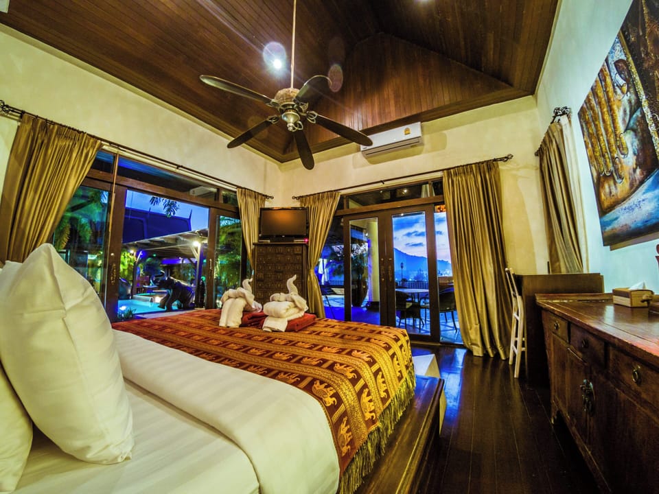 Master Bedroom next to the pool upstairs with good views