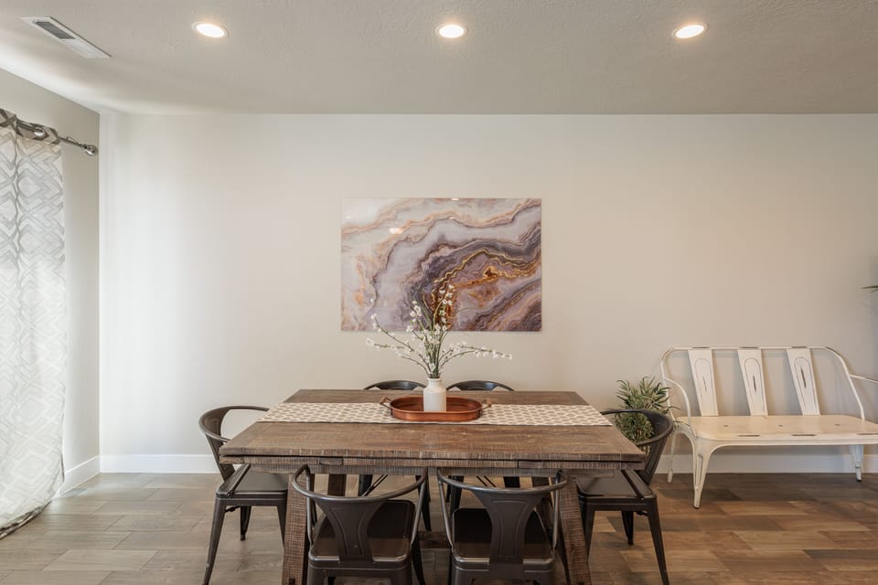 Dining Table - Sit down together and enjoy mealtime at the dining table.  Additional seats are located at the kitchen island.