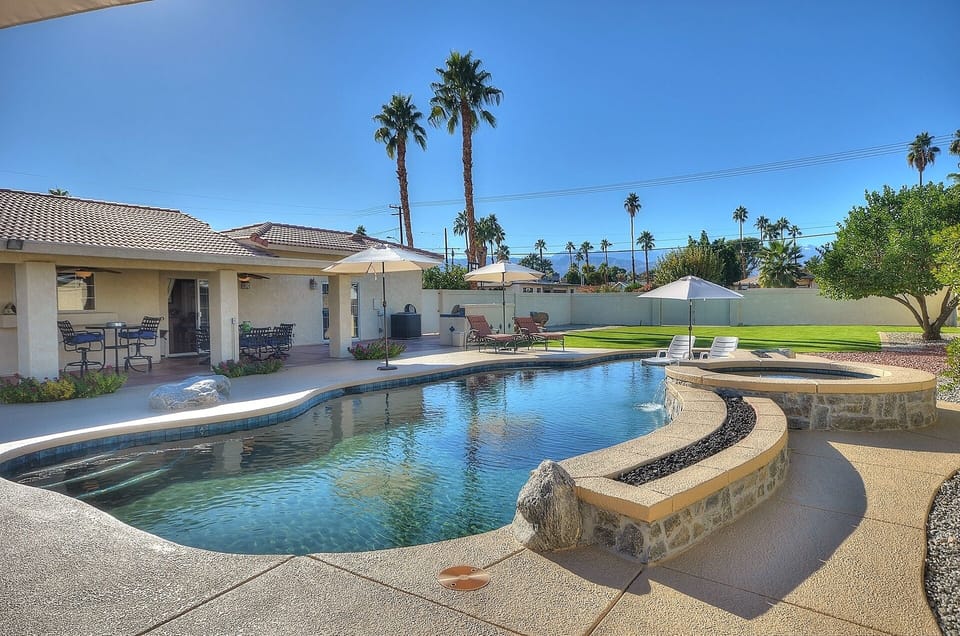 Oversize backyard with grassy area