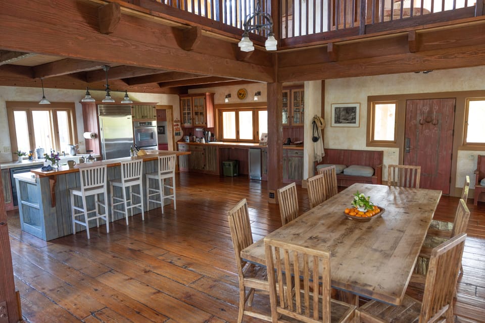Kitchen and large dining room table.