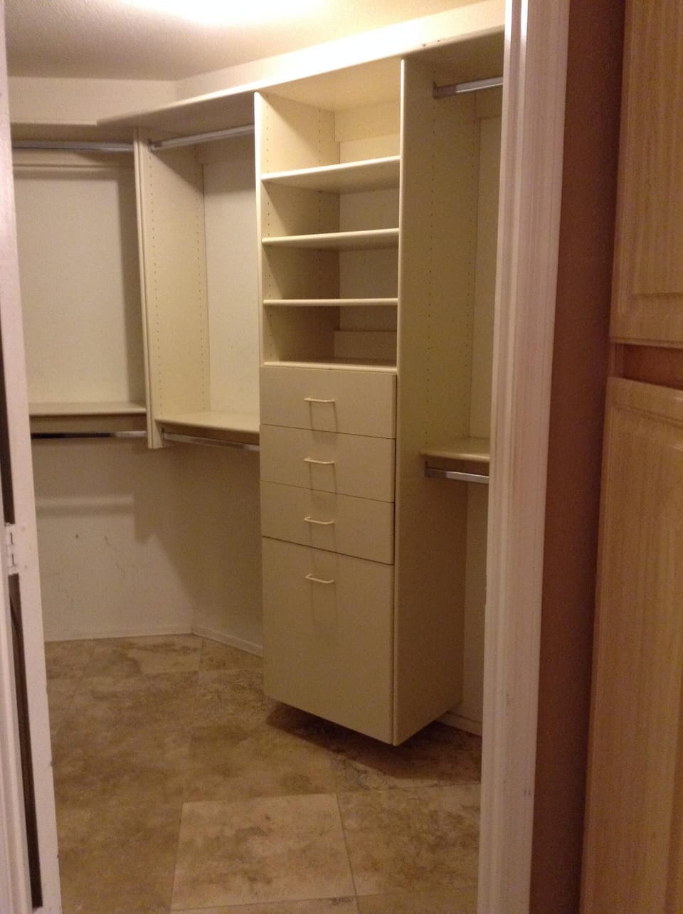 Walk in closet in primary bedroom
