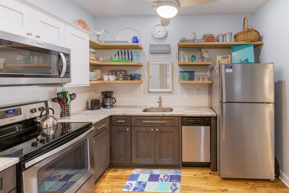 Provisions include coffee maker, electric kettle, toaster, crock pot, microwave, dishwasher