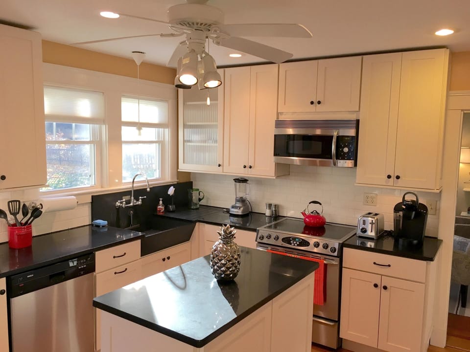 Updated chef's kitchen with modern appliances and plenty of counter space.
