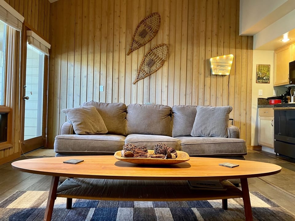 Cozy living room with door to patio/balcony