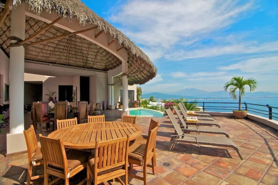 Outdoor dining under palapa