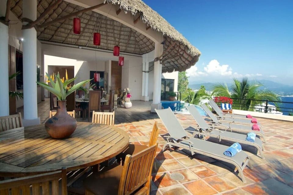 Outdoor dining under palapa