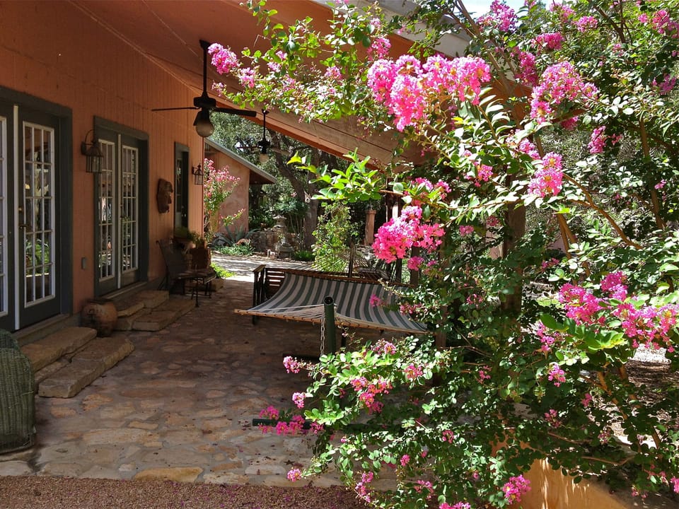 Porch of the Cottage covered with an outdoor eating table now...