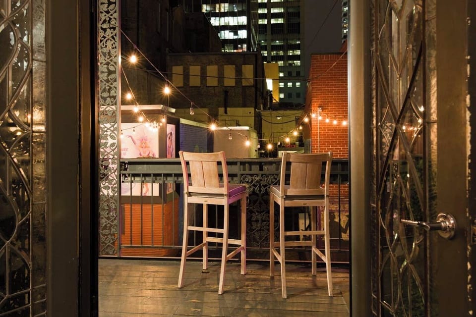 Grand Loft – Oversized Balcony for Relaxing Above Printers Alley