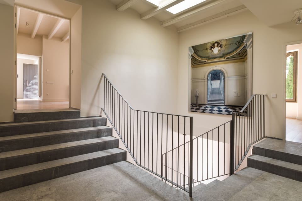 Hallway leading downstairs