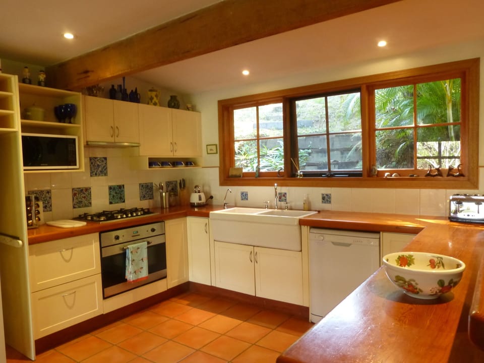 Rustic kitchen with butlers sink; most appliances are new