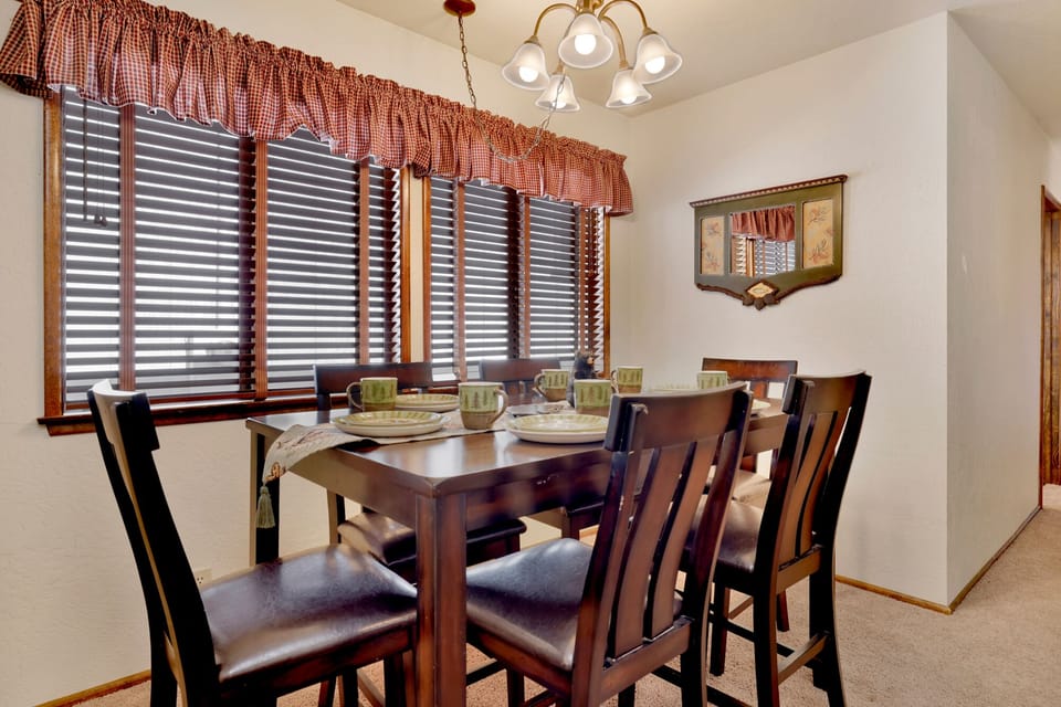 Inviting dining area designed for comfort and connection. The space feels open and airy, with a warm atmosphere that makes everyday meals and special gatherings equally enjoyable.